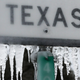 Icicles hang off the State Highway 195 sign that says "Texas."